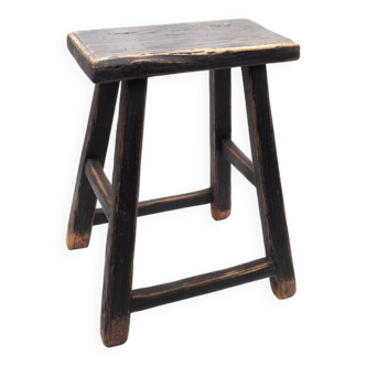 Rectangular stool in black raw elm