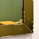 Striking French amber-coloured mirror with sculpted edge details, 1940s