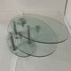 Oval designer coffee table in tempered glass