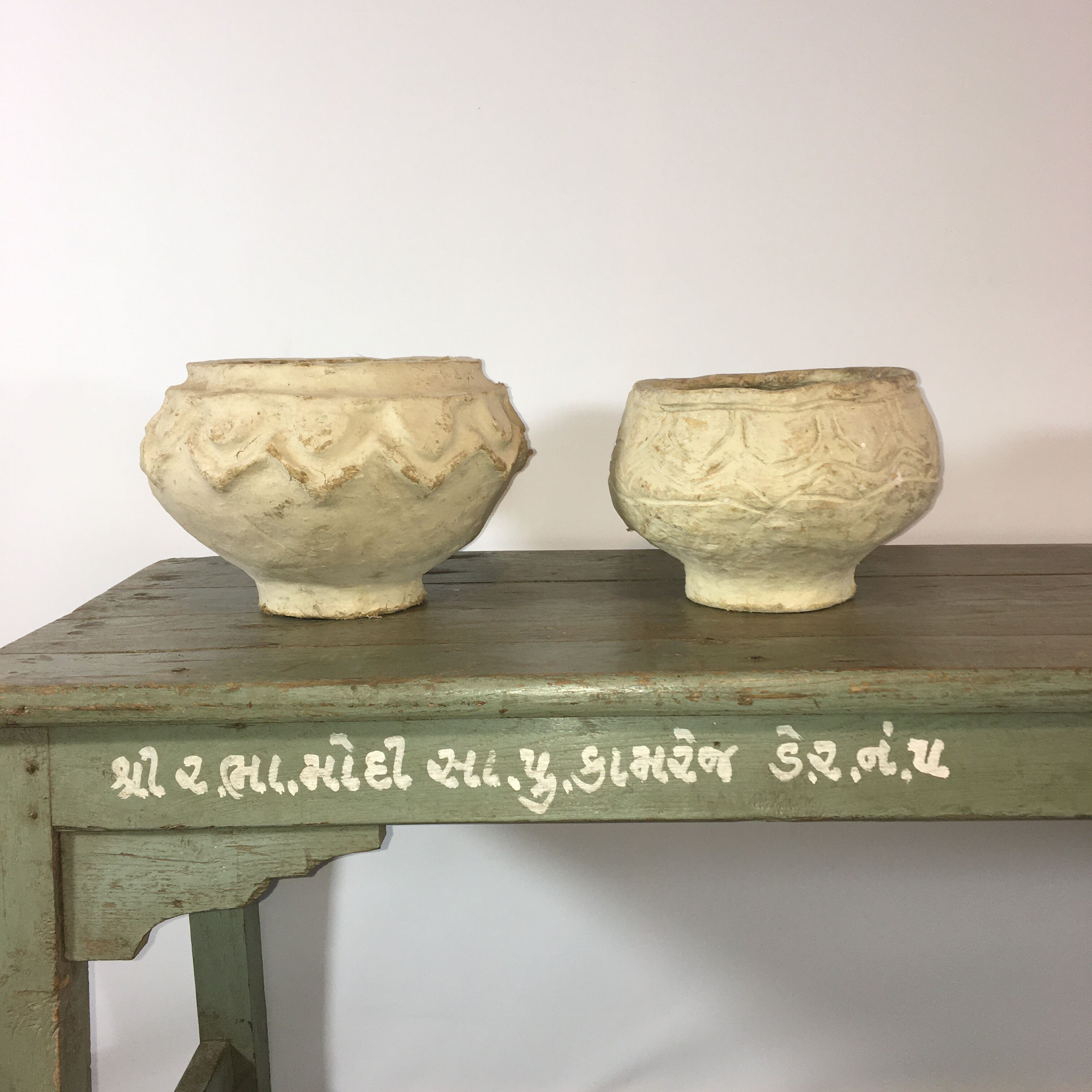 Grey lase wooden bench with inscriptions