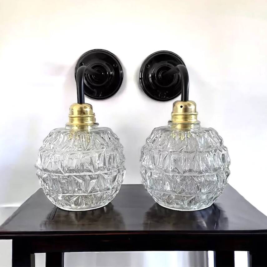 Pair of chiseled glass wall sconces