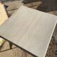 Pedestal table with airplane wing legs