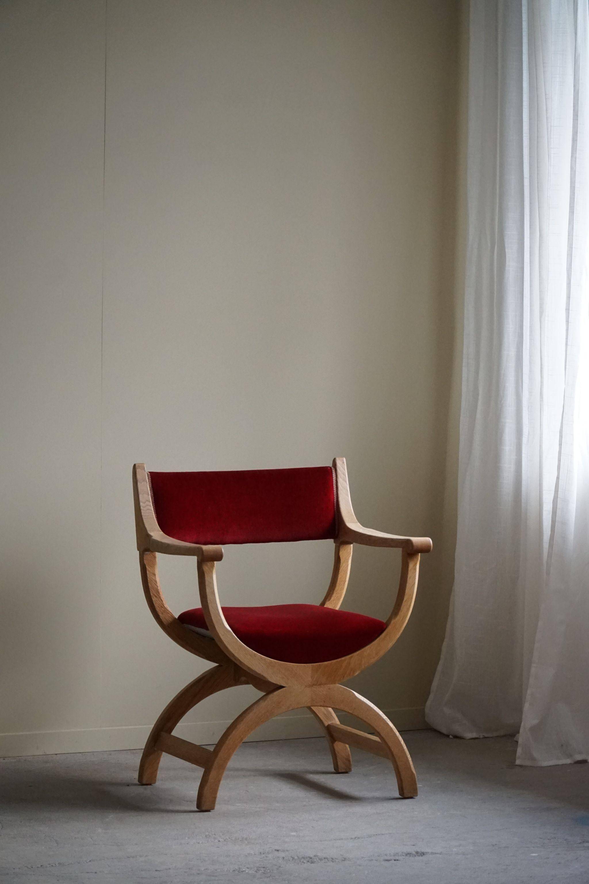 Henning Kjærnulf, armchair in oak and velvet, model "Kurul", mid-century, 1960s.