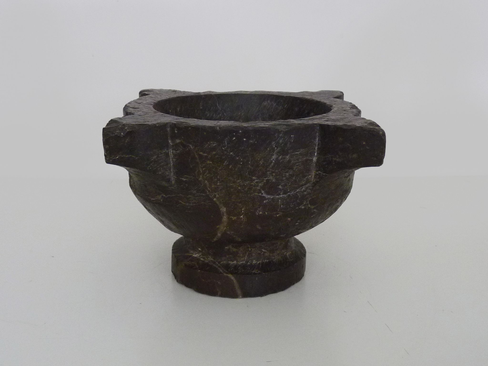 Old black marble apothecary mortar