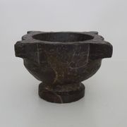 Old black marble apothecary mortar