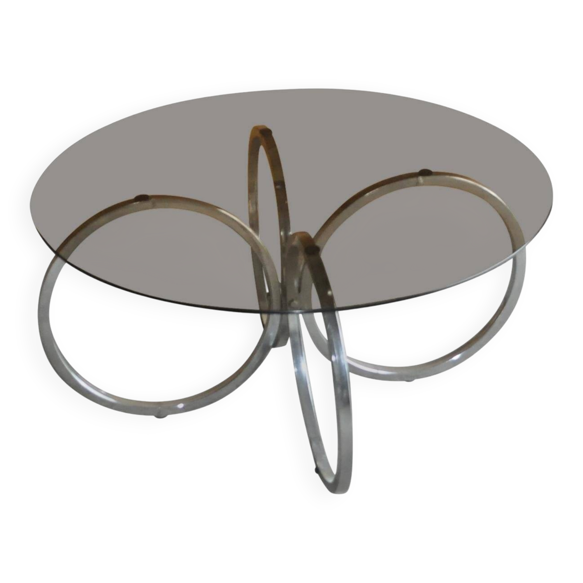 Vintage tubular coffee table in chrome with a transparent glass top, Mid-Century style 1960s.