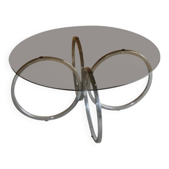 Vintage tubular coffee table in chrome with a transparent glass top, Mid-Century style 1960s.