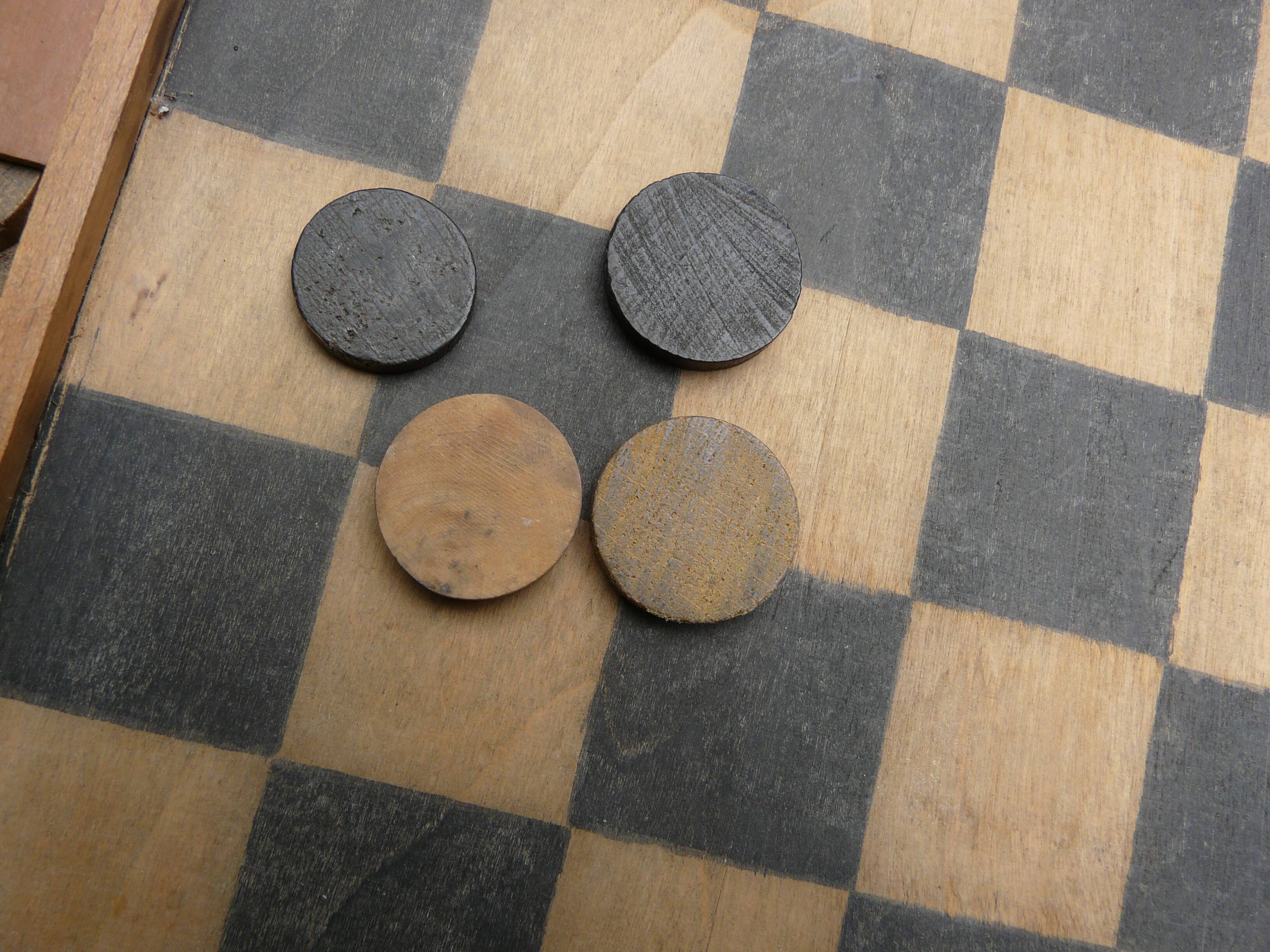 Old wooden checkers game