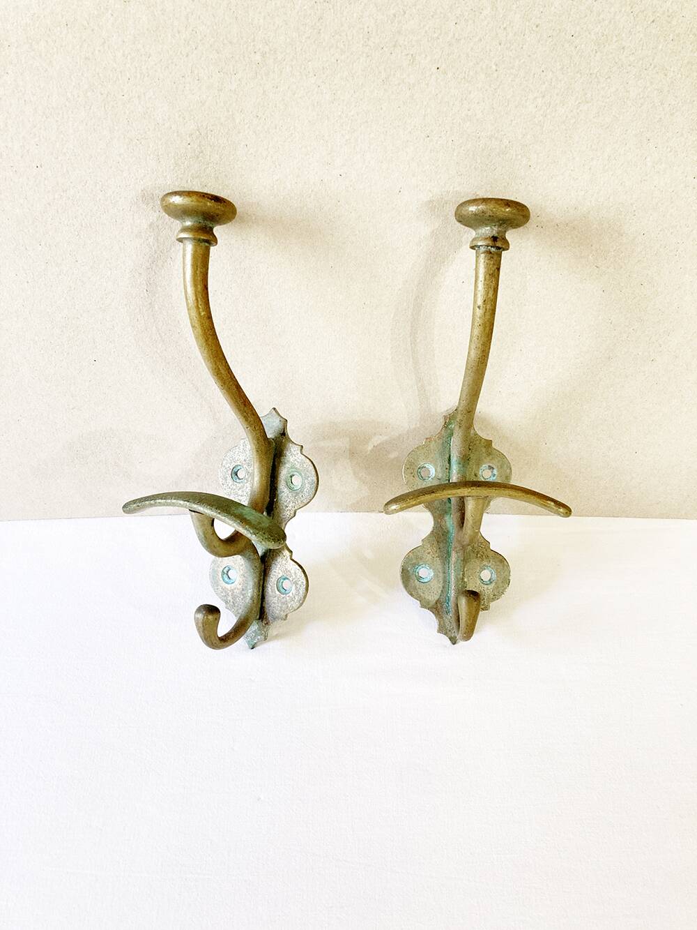 Antique patinated brass coat hooks