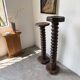Pair of pedestal columns with oak pressing screws, 1900