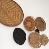 Wall composition of seven baskets and wicker trays