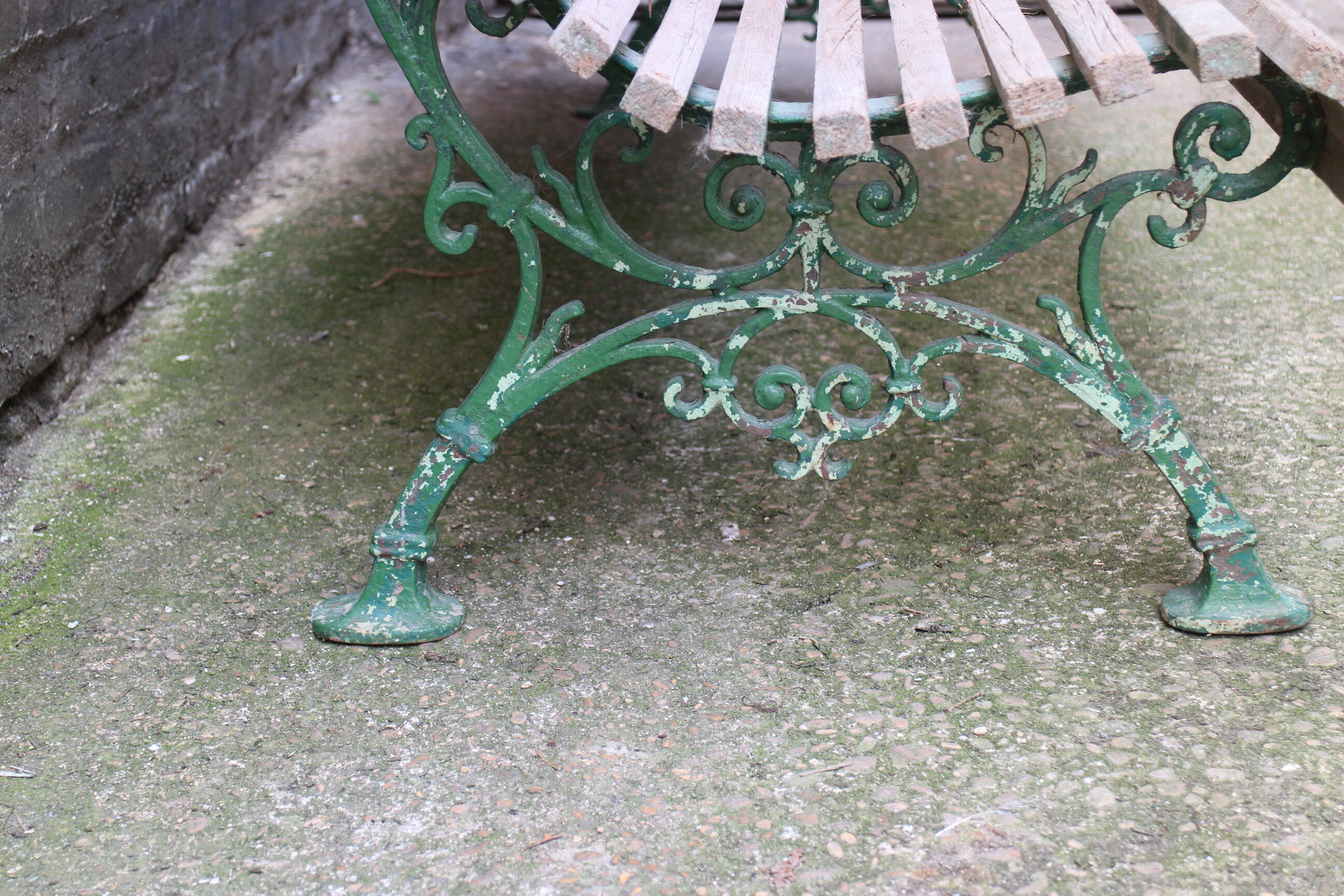 Old bench cast iron base and wooden slats
