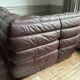 Togo set by Ligne Roset in vintage pink, plum, and burgundy leather.