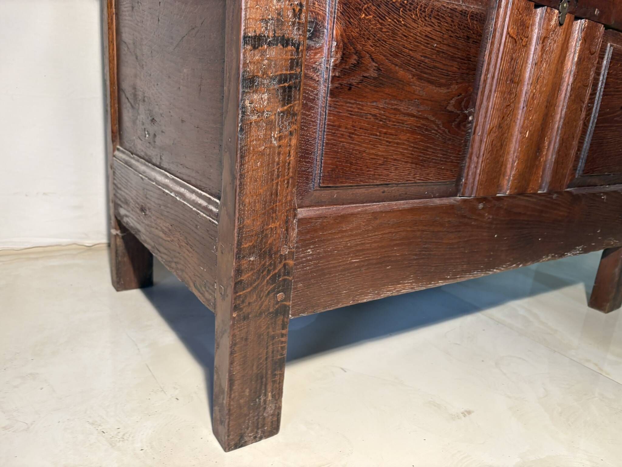 Rustic antique oak chest, original fittings and moulded panels.
