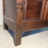 Antique rustic oak chest with original hardware and molded panels