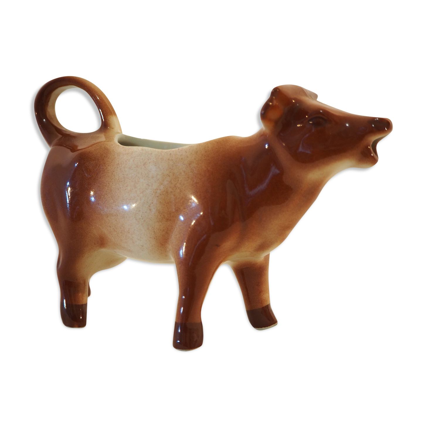 Milk jar in the shape of a vintage ceramic cow