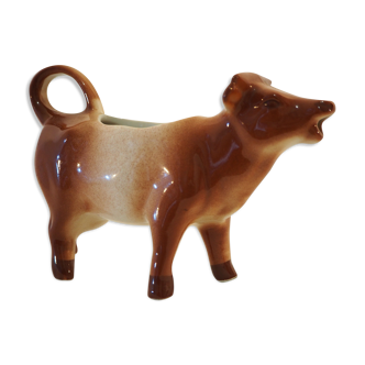 Milk jar in the shape of a vintage ceramic cow