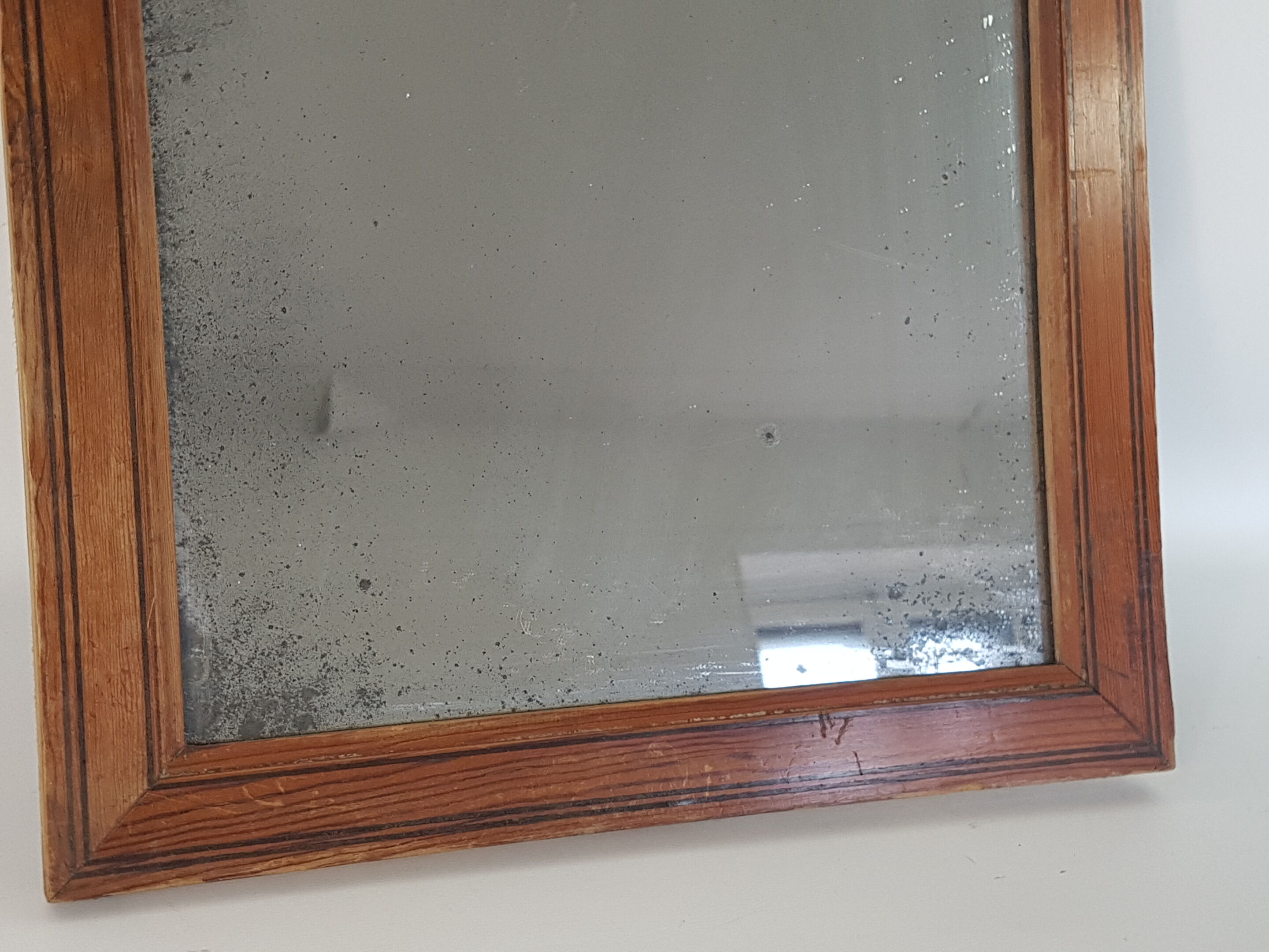 Old mirror in a netwood frame, 19th, 42 x 33 cm