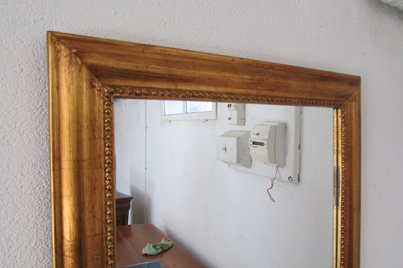 Rectangular mirror in gilded wood
