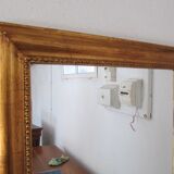 Rectangular mirror in gilded wood