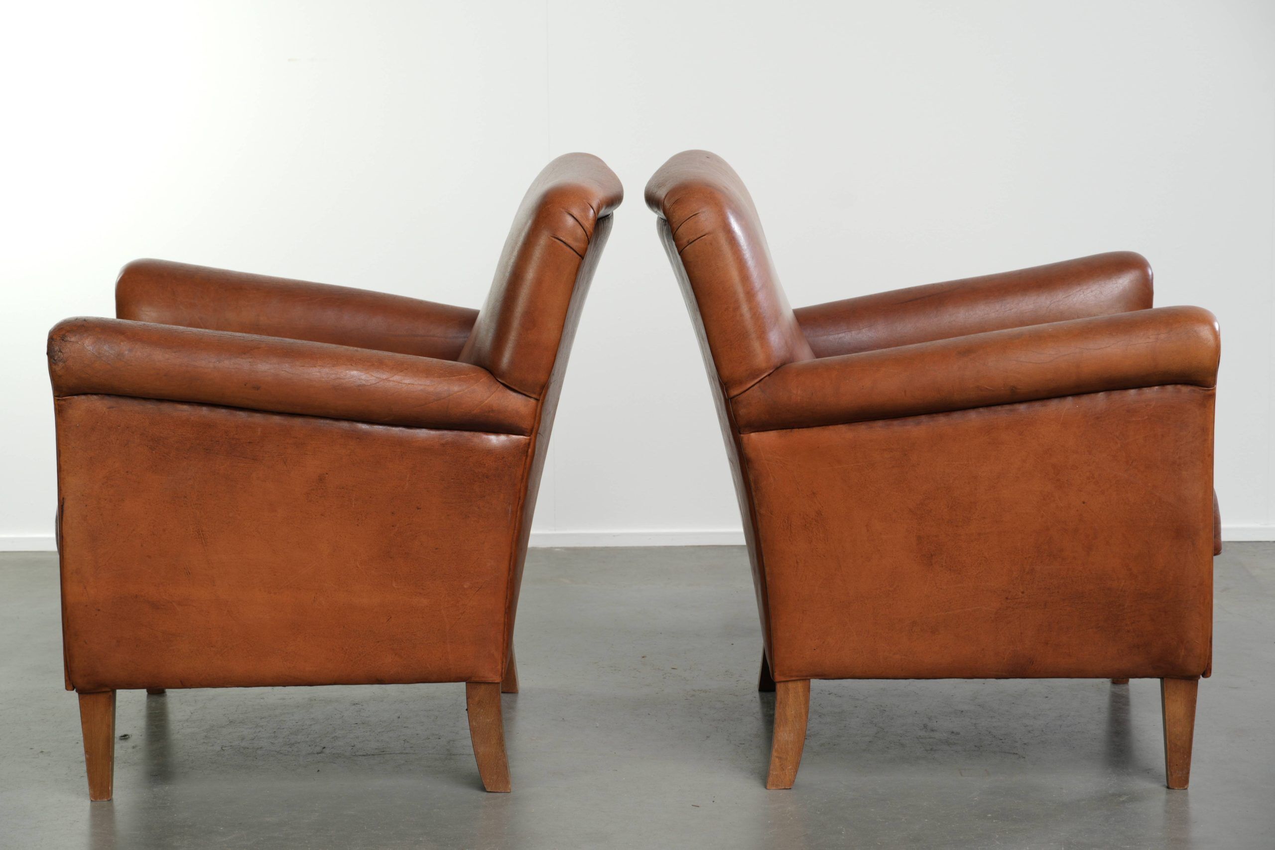 Comfortable set of sheepskin armchairs with and a timeless design
