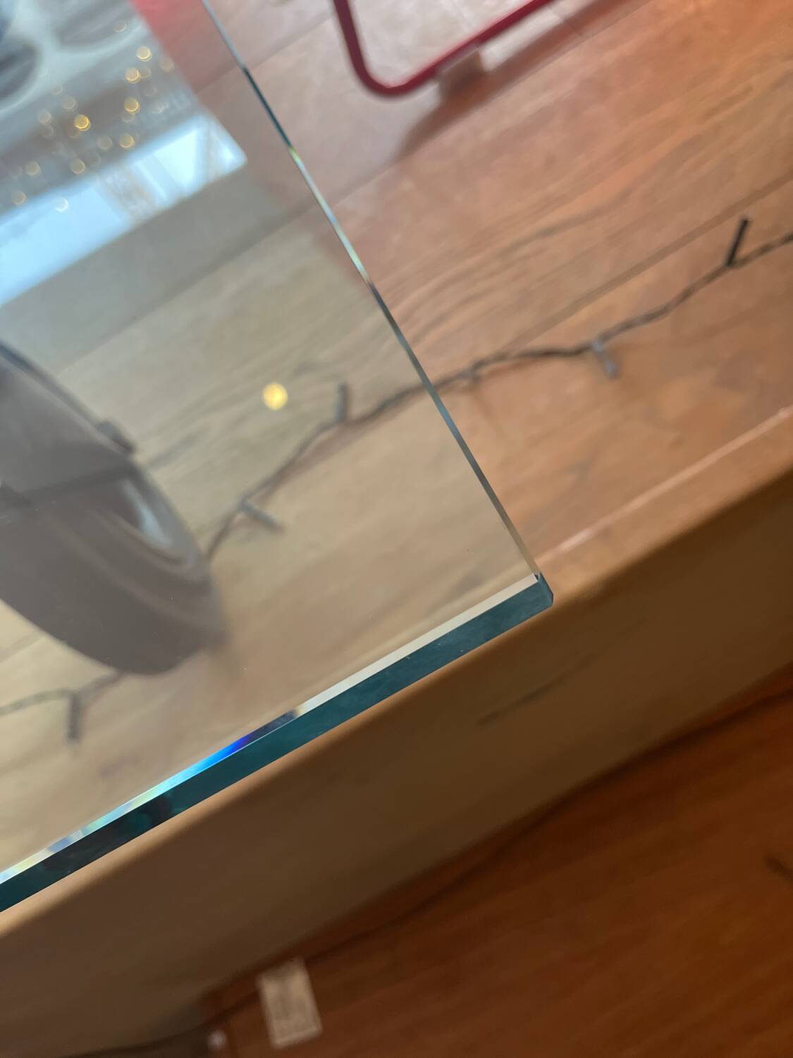 Gae Aulenti coffee table for Fontana Arte, transparent glass top with black cast iron supports, 1980s.