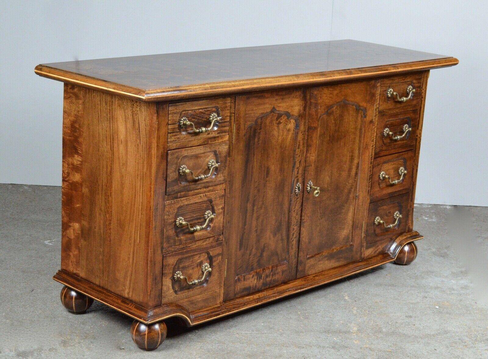 Rustic walnut sideboard with inlaid parquetry, vintage quality.