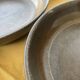 Organic earthenware deep plates from Gré du Marais, France.