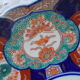 Ancient round porcelain dish from Japan Imari