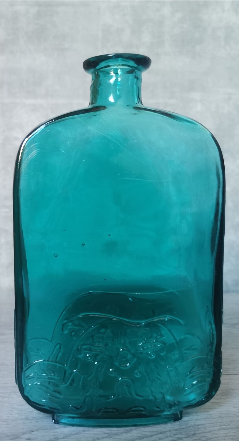Blue engraved glass bottles