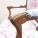 Antique cabriolet armchair in pink toile de Jouy.