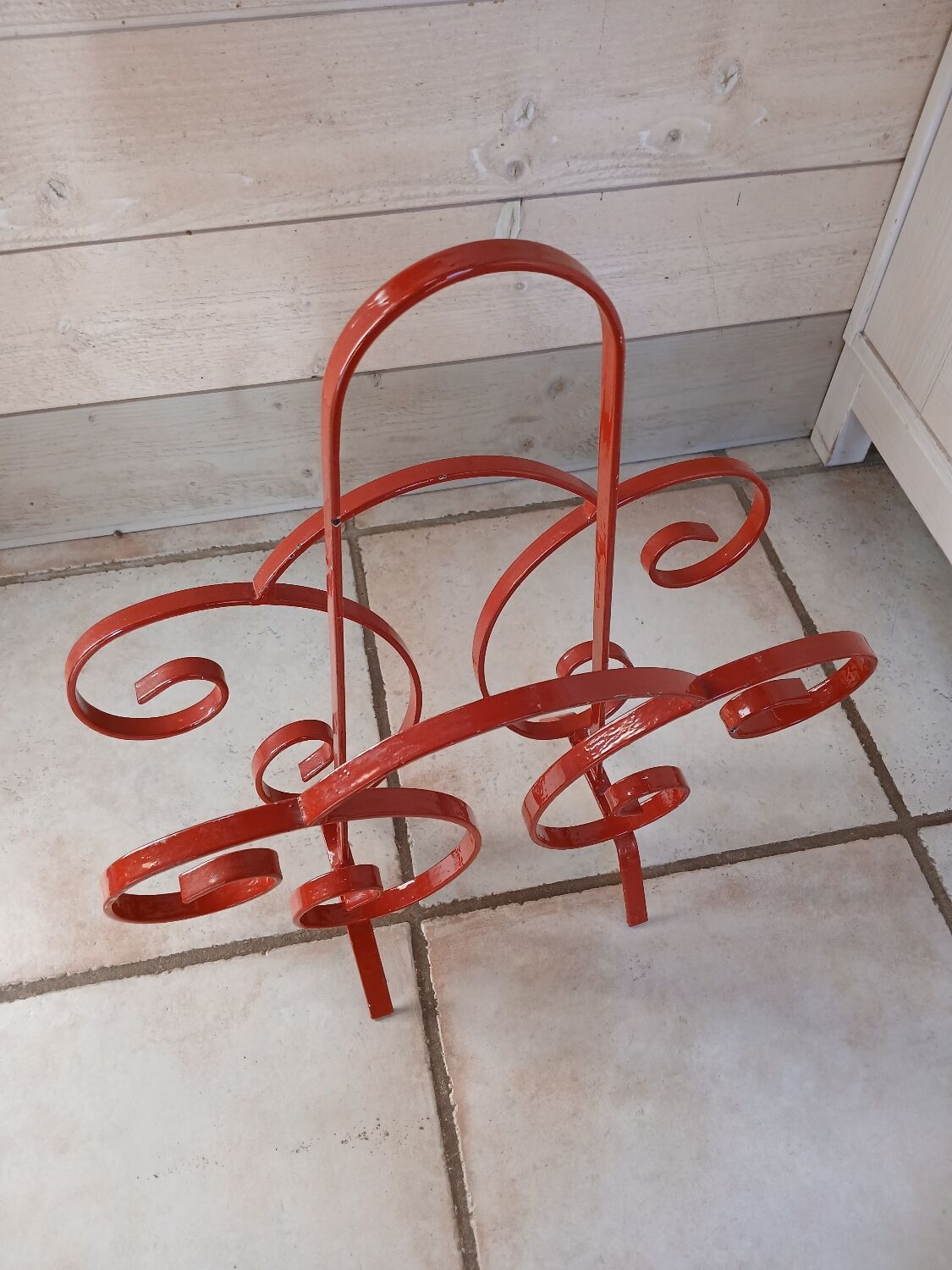 Vintage wrought iron magazine rack