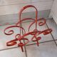 Vintage wrought iron magazine rack