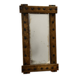 Brutalist mirror with a hammered copper and brass frame.