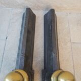 Pair of cast iron and bronze chenets