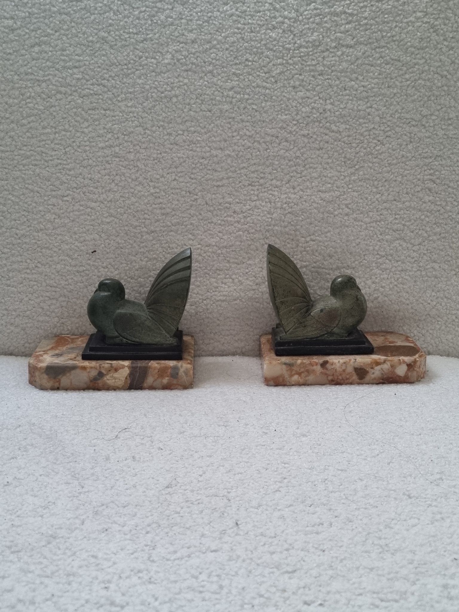 Pair of greenhouse book Art Deco animal sculpture marble base