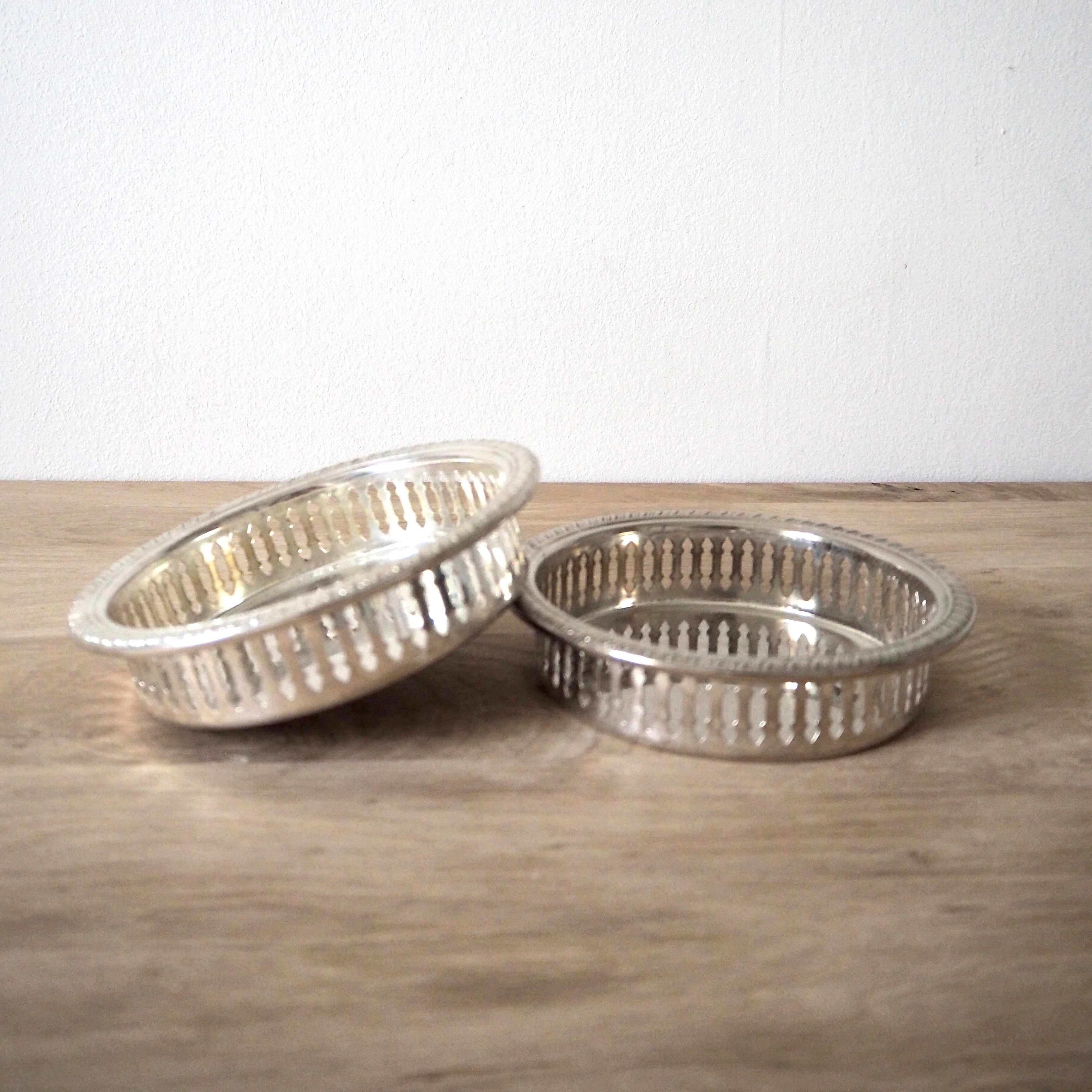 Pair of silver bottle underbellies