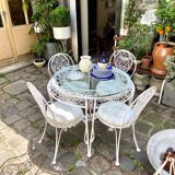 Garden furniture in white wrought iron and beveled glass early twentieth century