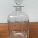 Vintage Danish glass bottle with engraving.