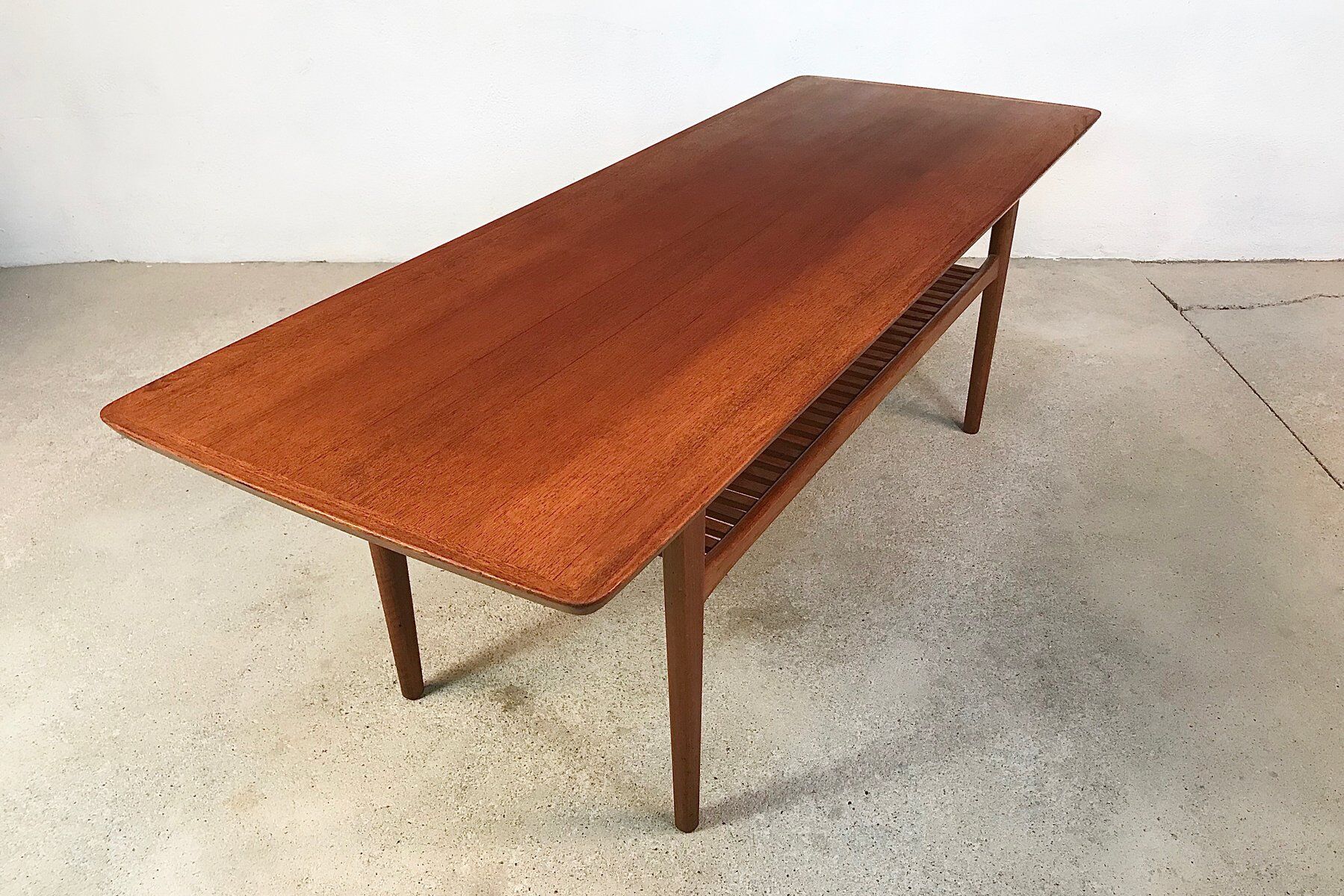 Scandinavian teak coffee table with slatted shelf, Denmark 1960s