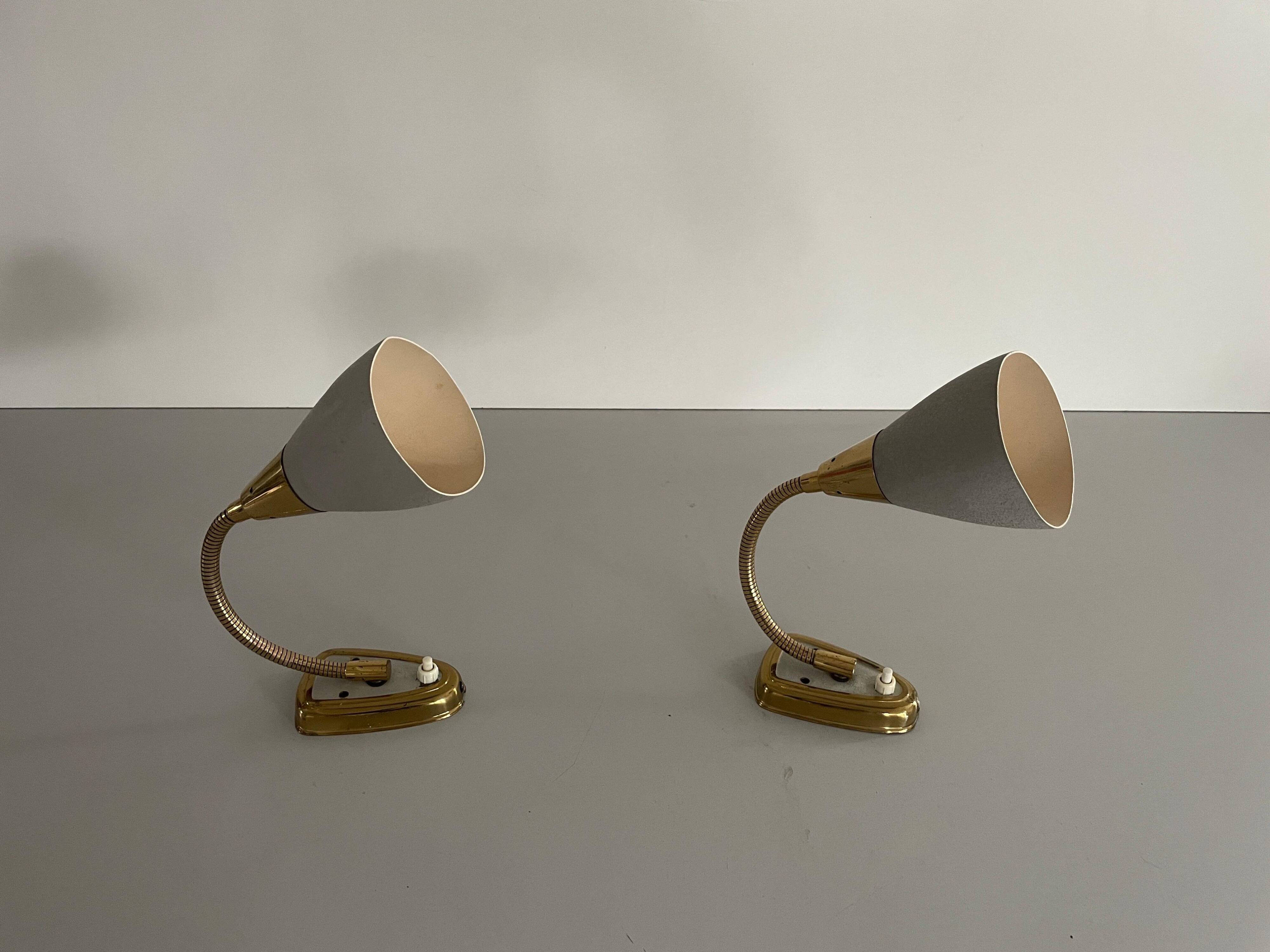 Pair of grey metal and brass wall lights, 1960s, Germany