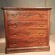 Small Louis Philippe chest of drawers with cut corners.