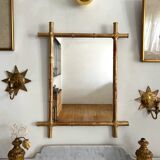 Mirror in gilded stucco, bamboo patina and gold leaf.