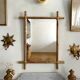 Mirror in gilded stucco, bamboo patina and gold leaf.