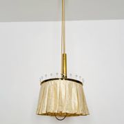Suspension réglable avec contrepoids par Vereinigte Werkstätten München