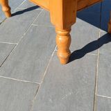 Solid oak coffee table with turned legs.