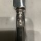 12 silver-plated metal knives. levert silversmith