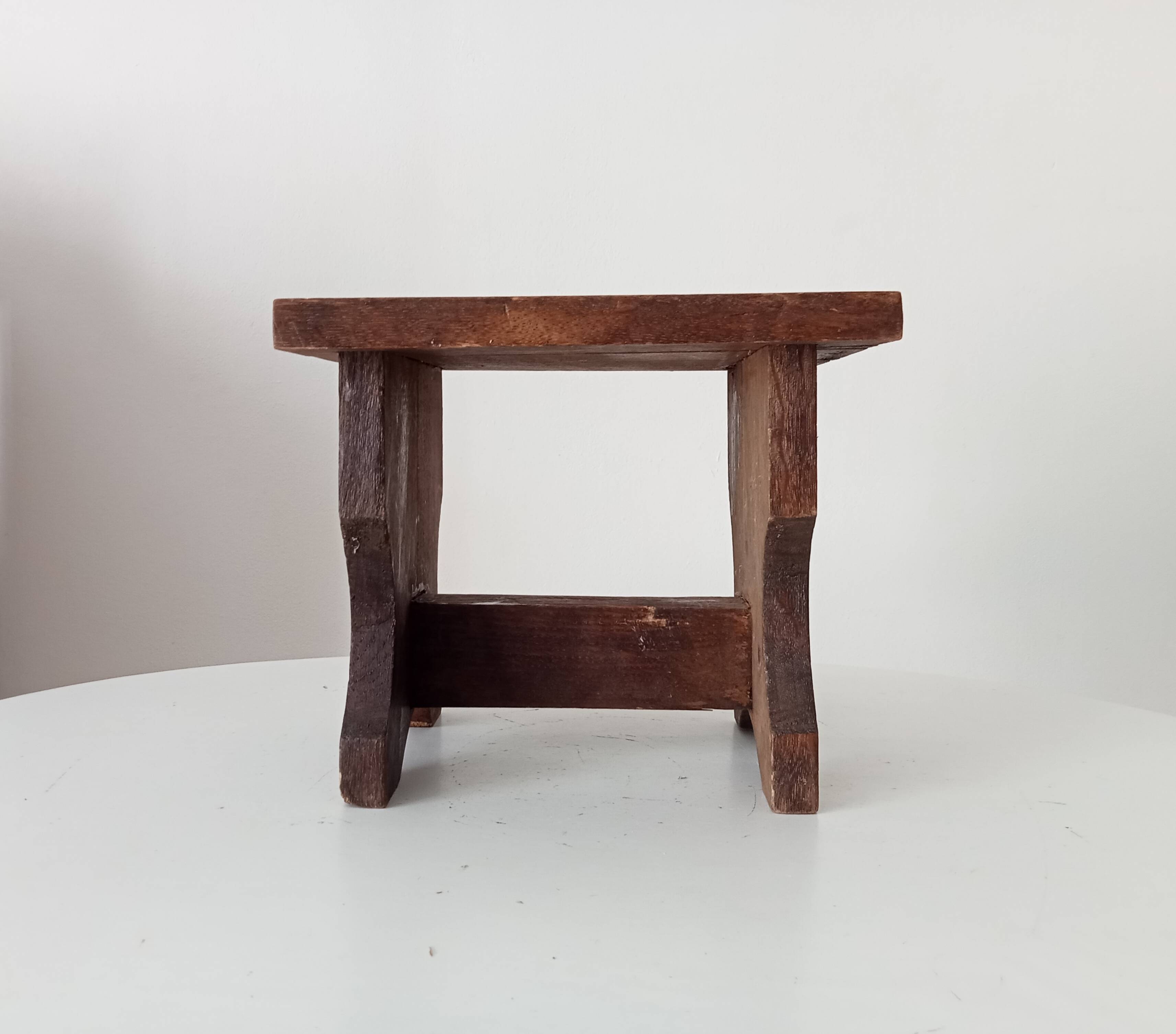 Ancient primitive milking stool