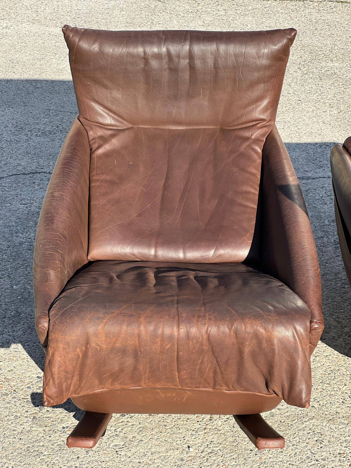 Pair of rocking chairs by De Sede, Switzerland 1970 in brown buffalo leather.