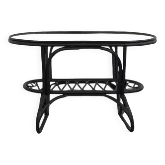 Black rattan and glass coffee table